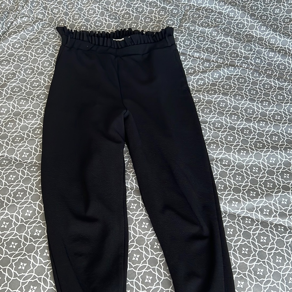 Gently used Flounce London cigarette pants with paperbag waist in black